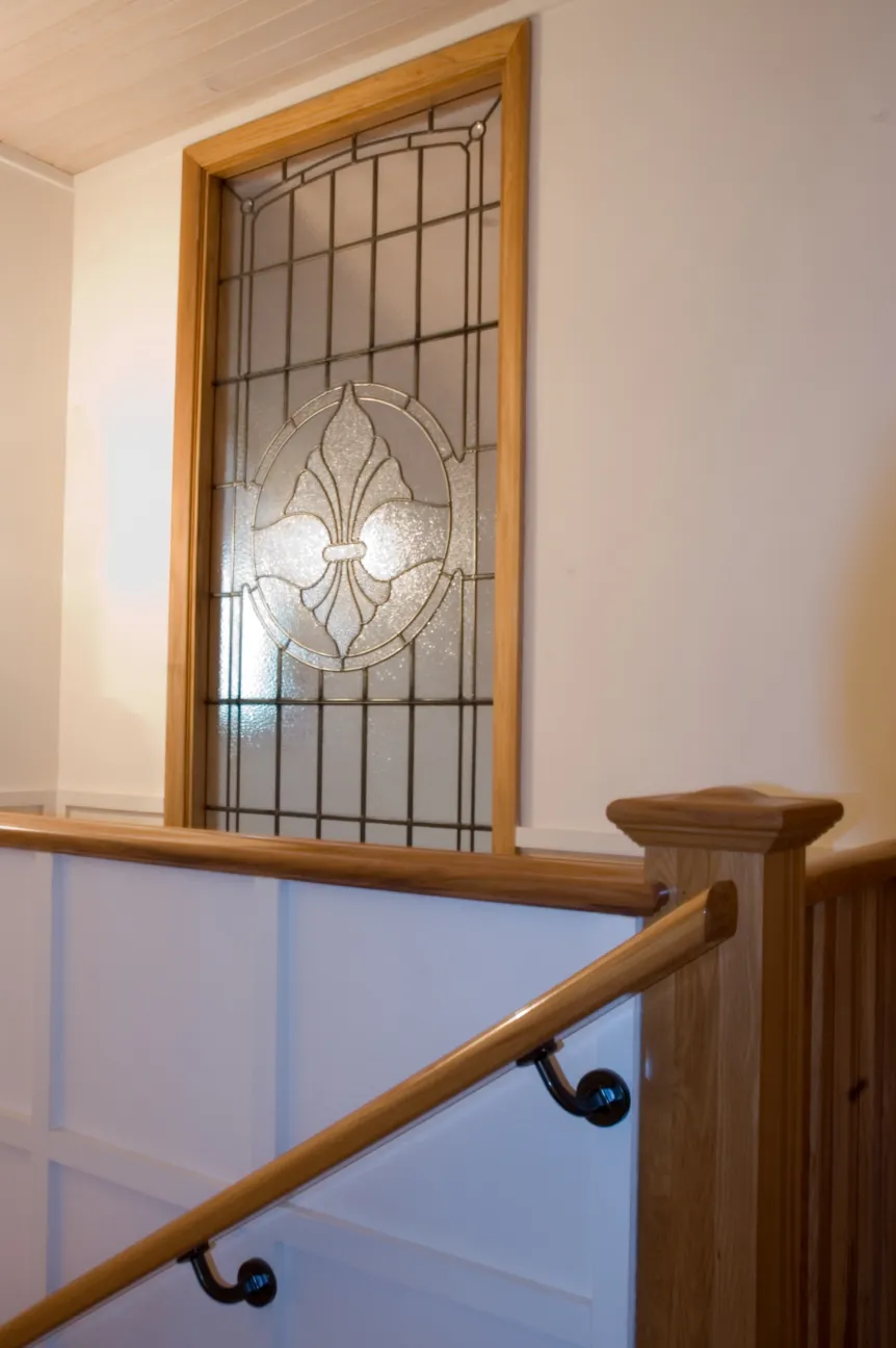 Davis Residence — stairwell with leadlight window