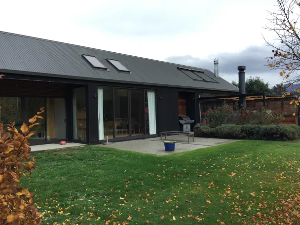 Speargrass Flat Residence — garden elevation with sliding doors to the lawn